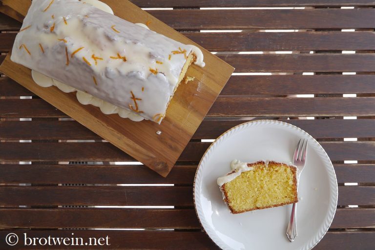 Saftiger Orangenkuchen mit Orangenzuckerguss - Brotwein Saftiger Orangenkuchen mit Orangenzuckerguss - Brotwein